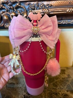 Pink bedazzled tumbler . A real statement piece for you to use or display.